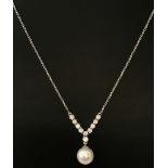 A modern elegant design diamond and pearl drop, 18ct white gold necklace by Luke Stockley.