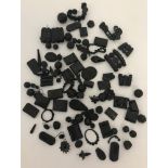 A collection of antique and vintage Whitby Jet beads, some with carved decoration.