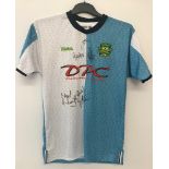A Norwich City FC blue/white centenary Xara DPC shirt signed by players and manager.