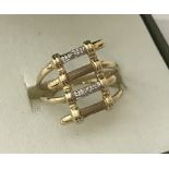 A 9ct gold ladies contemporary design dress ring.