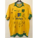 A 2009/10 player signed Aviva Norwich City FC home shirt by Xara.