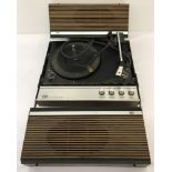 ITT Portable Stereo 4 Speed Record Player with built in speakers.