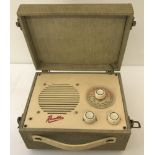 A 1960's Rambler LW MW portable radio in cream coloured case with lift up lid.