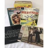 A box of assorted vintage vinyl LP's to include Comedy, Soundtracks & Military.