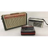 2 small vintage portable radios together with a Murphy Portable personal cassette player.