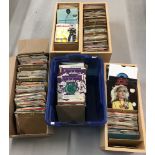 A large collection of over 900 vintage 7" singles in alphabetical order.