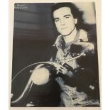 A signed magazine poster of a young Daniel Day Lewis, actor.