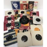 A collection of 25 Elvis Presley 7" singles.