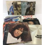 A collection of assorted vintage vinyl records to include Carly Simon, Frank Sinatra, Roy Orbison &