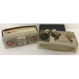 2 small vintage hand held portable reel to reel tape recorders.