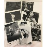 A collection of original horror film publicity stills and one negative.
