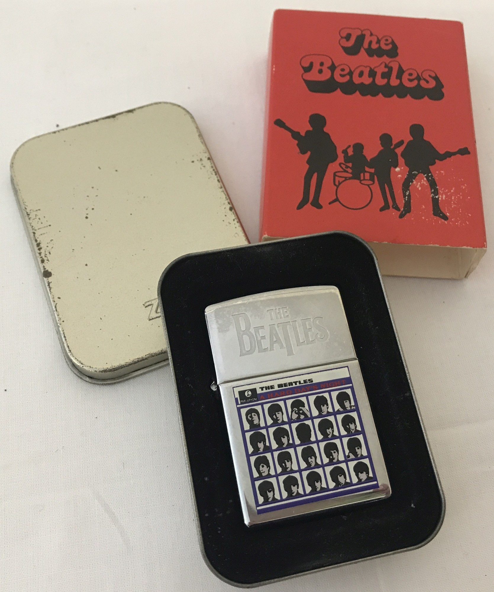 A cased The Beatles "A Hard Days Night" Collectors Zippo Lighter, unfueled and in as new condition.