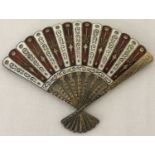 A vintage Siam sterling silver red and white enamelled fan brooch.