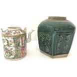 A Chinese ceramic Famille Rose teapot together with a green glazed stoneware ginger jar.