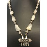 An Asian style necklace made from Tibetan quartz, white freshwater pearls and white metal beads.