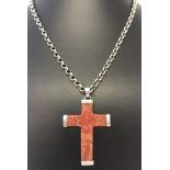 A red jasper cross pendant on a 18 inch silver belcher chain.