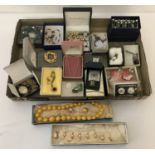 A collection of boxed vintage costume jewellery to include necklaces, brooches and bracelets.