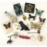 A small collection of animal and insect brooches.