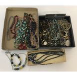 2 trays of vintage and modern necklaces.