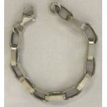 A silver large link belcher chain bracelet.