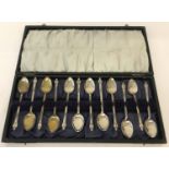 A cased set of 12 silver plated Apostle spoons.