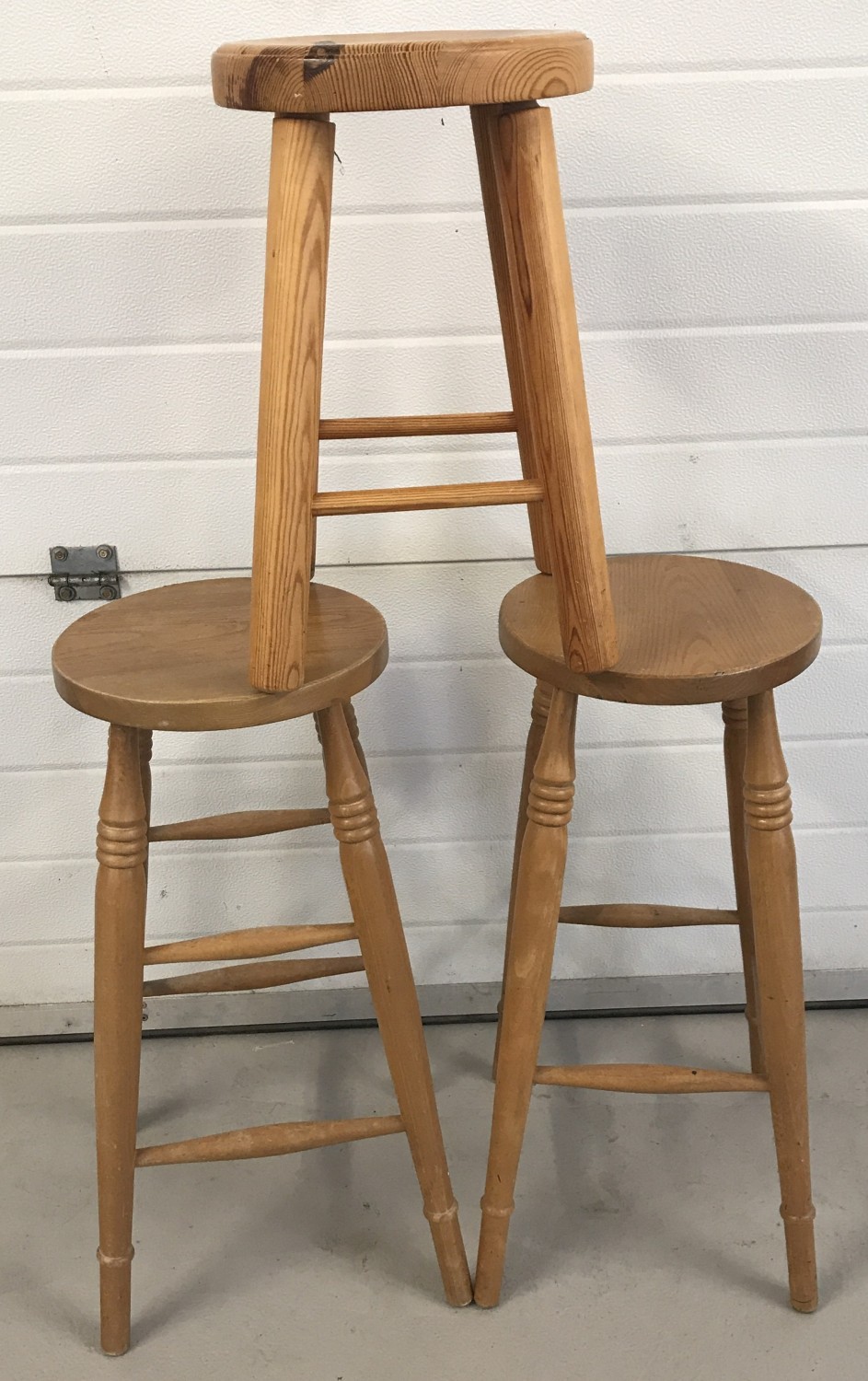 3 vintage pine stools. A pair of high stools with turned detail to legs together with one other.