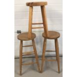 3 vintage pine stools. A pair of high stools with turned detail to legs together with one other.