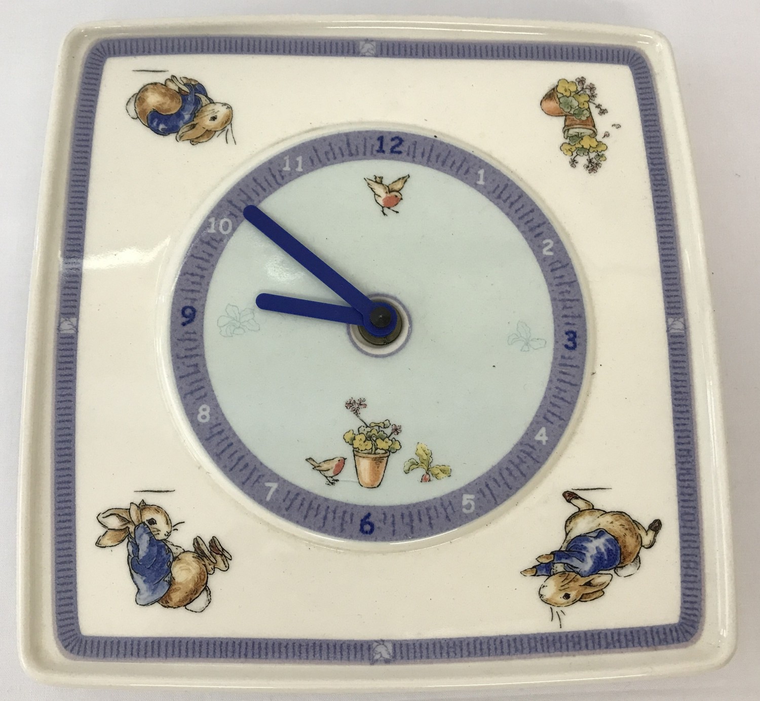 A Wedgwood Beatrix Potter's Peter Rabbit ceramic wall clock.