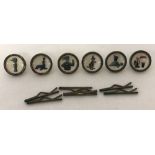 A collection of 6 original vintage Guinness buttons complete with their fastening pins.