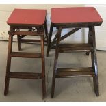 2 vintage wooden folding sets of steps with red melamine tops.