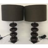 A matching pair of 1970's brown ceramic table lamps.