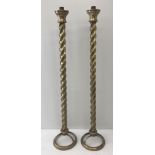 A large pair of vintage twisted stem pedestal stands, possibly parts from a lighting fitment.