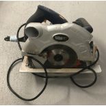 A 2000W Macallister circular saw with a 7" blade.