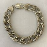 A decorative link bracelet with lobster clasp. Fixings and clasp marked 925 PAL.