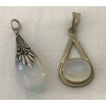 2 modern design drop pendants set with moonstones. One marked 925.