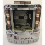 A vintage AMI Music wall box selector juke box. For spares or repair.