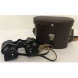 A pair of Carl Zeiss 8x30 Deltrintem binoculars in a leather case.