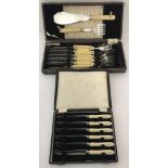 2 vintage boxed cutlery sets. A set of fish knives and forks, complete with servers