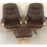 2 modern design matching brown leather and light wood swivel and reclining armchairs.