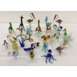 A collection of small vintage glass animal figurines.