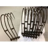 A large quantity of curved tines as taken from a 1930's horse drawn hay rake.