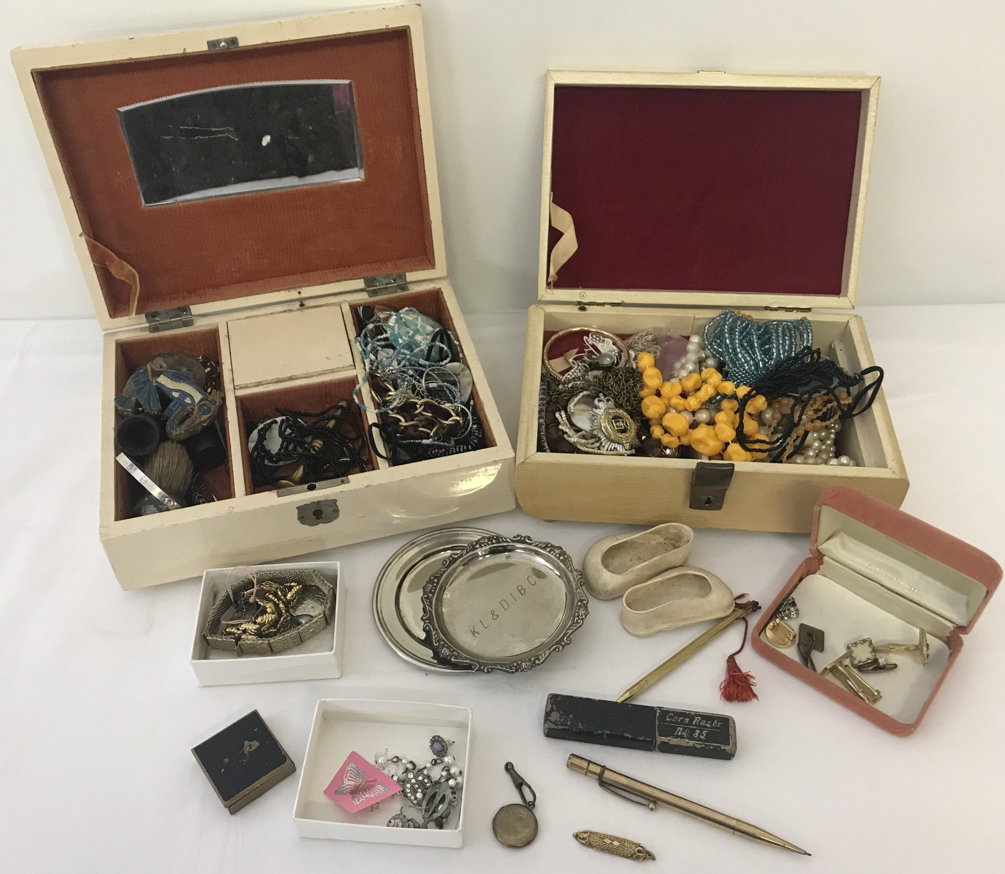 2 vintage jewellery boxes containing vintage costume jewellery. Together with other mixed items.