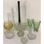 A quantity of vintage clear and coloured glass items.