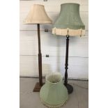 An Art Deco standard lamp with stepped base and cream shade.