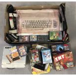 A Commodore 64 console together with a quantity of accessories and games.