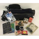 A box of camera accessories to include a Prinzflex auto 2x converter lens & a Topcore MC 55mm lens.