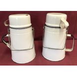 2 vintage white enamel billy cans with metal handles and removable cup lid.