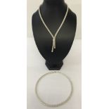 2 modern design necklaces in new condition.