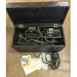 A c1940's Cintel metal detector with oscillator in original wooden case.