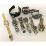 A collection of 9 men's assorted wrist watches to include gold tone Pulsar.